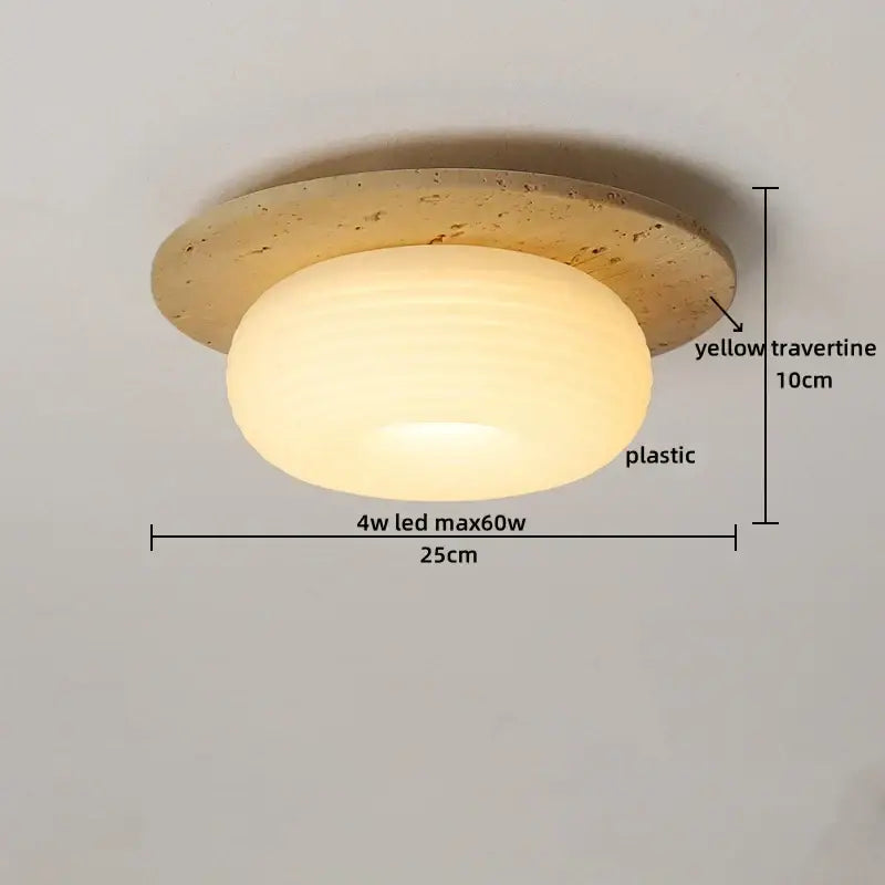 A warm led ceiling lamp with yellow travertine base and frosted plastic diffuser for living room lighting