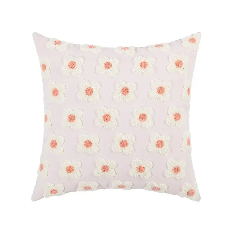 Pastel pink embroidered flora cotton pillow cover with white daisies and coral centers for bedroom sham use