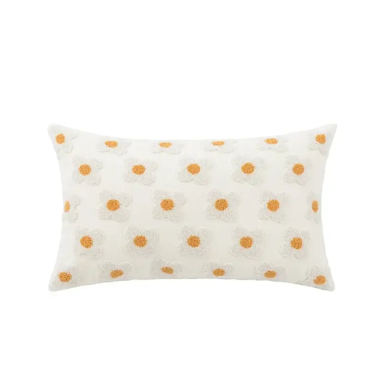 Cream-colored rectangular pillow cover with embroidered white and mustard-yellow flora cotton patterns for bedroom sham