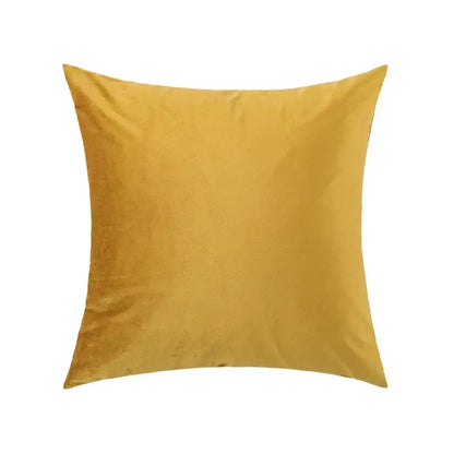 Yellow and white embroidered flora cotton pillow cover with square mustard-yellow velvet texture and subtle sheen