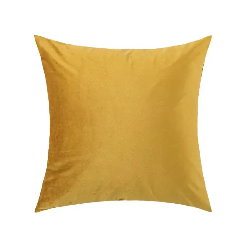 Yellow and white embroidered flora cotton pillow cover with square mustard-yellow velvet texture and subtle sheen