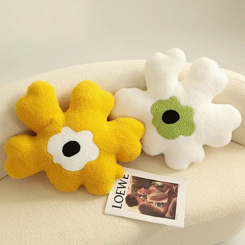 Yellow and white flower shaped decorative throw pillows with fuzzy texture and black centers for living room decorbites 3d flower
