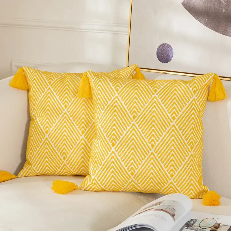 Bright yellow cushion cover with white geometric embroidery canvas and tassels for living room decorbites geometric embroidery
