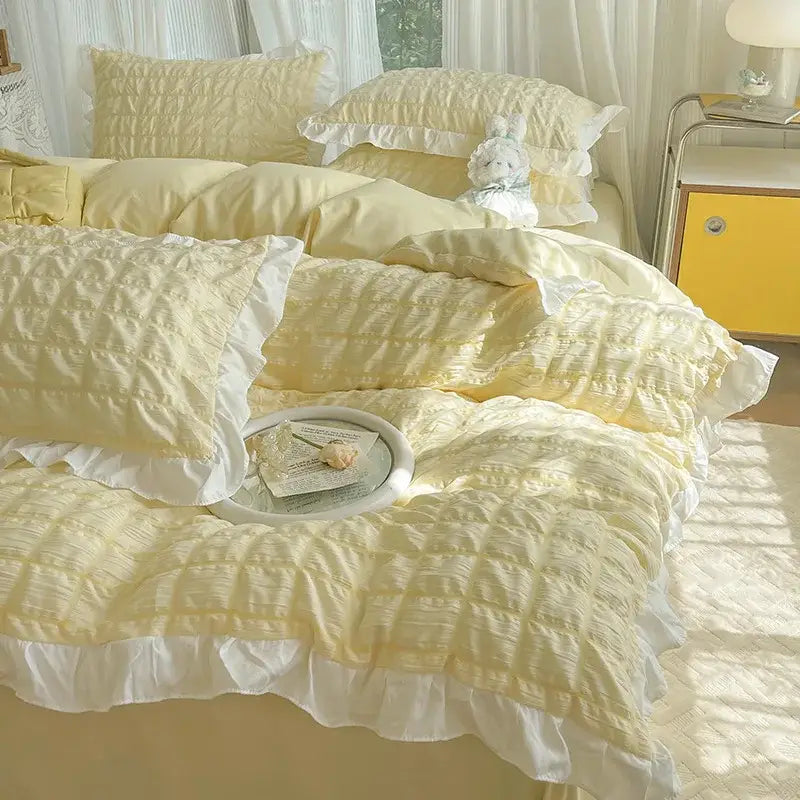 Soft yellow bubble gauze duvet cover set with delicate white ruffles for elegant bedroom bedding cover set