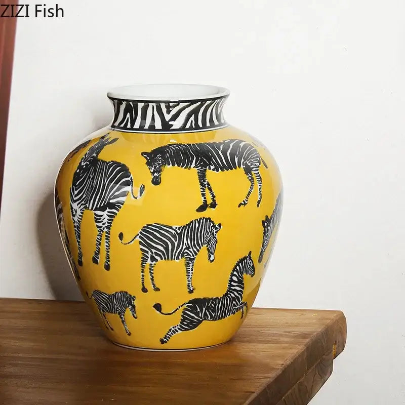 Zebra yellow ceramic vase with black and white zebra patterns and artificial flowers for desk decoration
