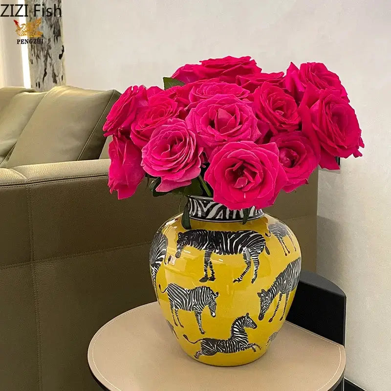 Vibrant yellow ceramic zebra yellow vase with black and white zebra illustrations and artificial flowers for desk decoration