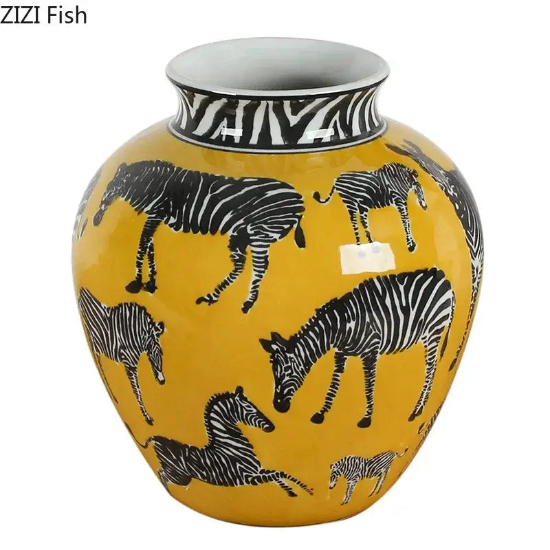 A vibrant yellow ceramic zebra yellow vase with black and white zebra illustrations holding artificial flowers for desk decoration