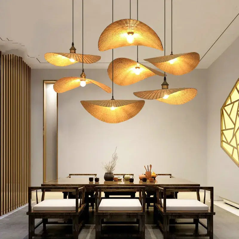 Warm-toned semi-circular bamboo zen tea pendant light with woven texture and brass accents for tea room chandelier use