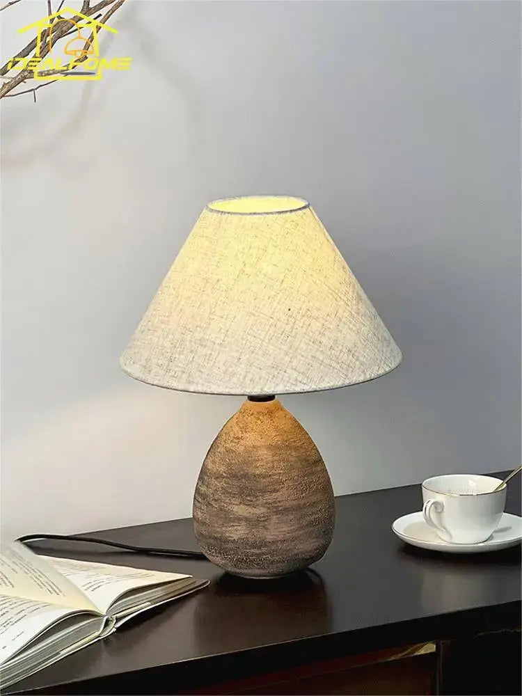 Earthy-toned decorbites ceramic jar led table lamp with textured teardrop base and beige linen shade for living room decor