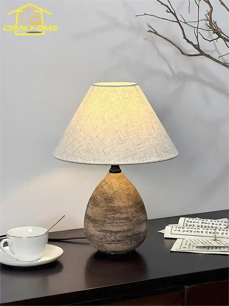 Earthy textured decorbites ceramic jar led table lamp with beige linen shade for living room decor and ambiance