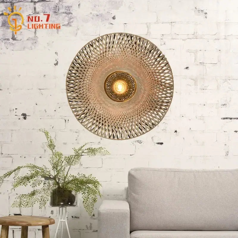 Zen natural bamboo weaving wall lamp with a circular design and warm golden glow for living room wall lamp decor