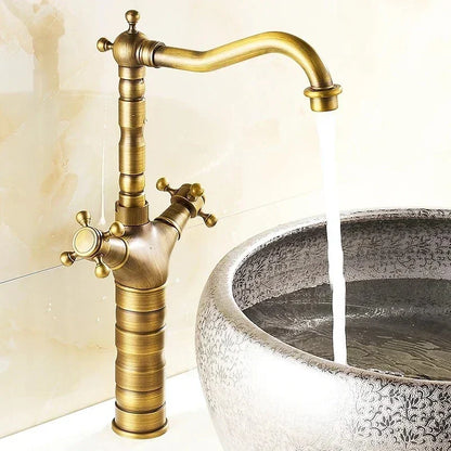 Antique brass finished deck mounted dual handles basin faucet with curved spout and ceramic single hole sink housing material